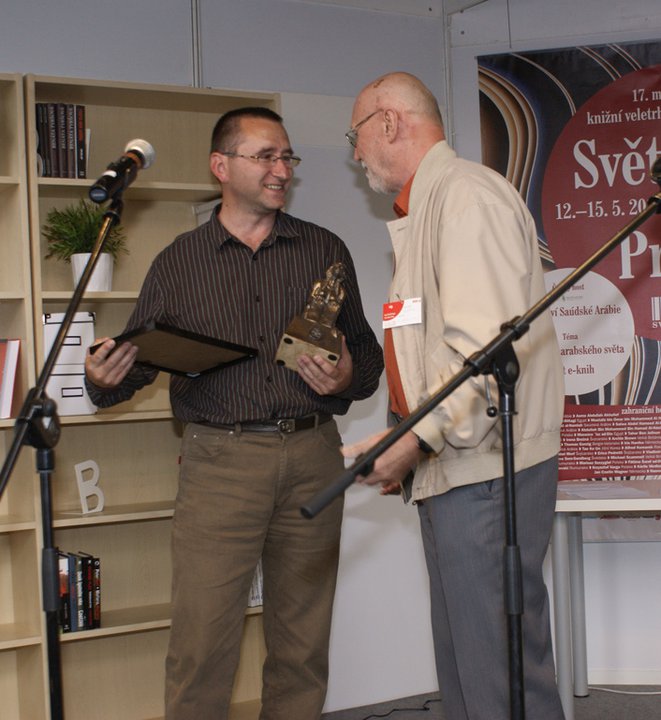 Petr Recieves the award on behalf of Rob from František Novotný Petr Recieves the award on Behalf of Rob from František Novotný